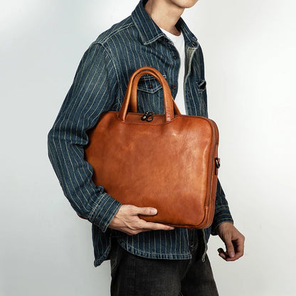 Luxury handcrafted vegetable-tanned leather briefcase for men, perfect for business and laptop use, with a vintage design and st